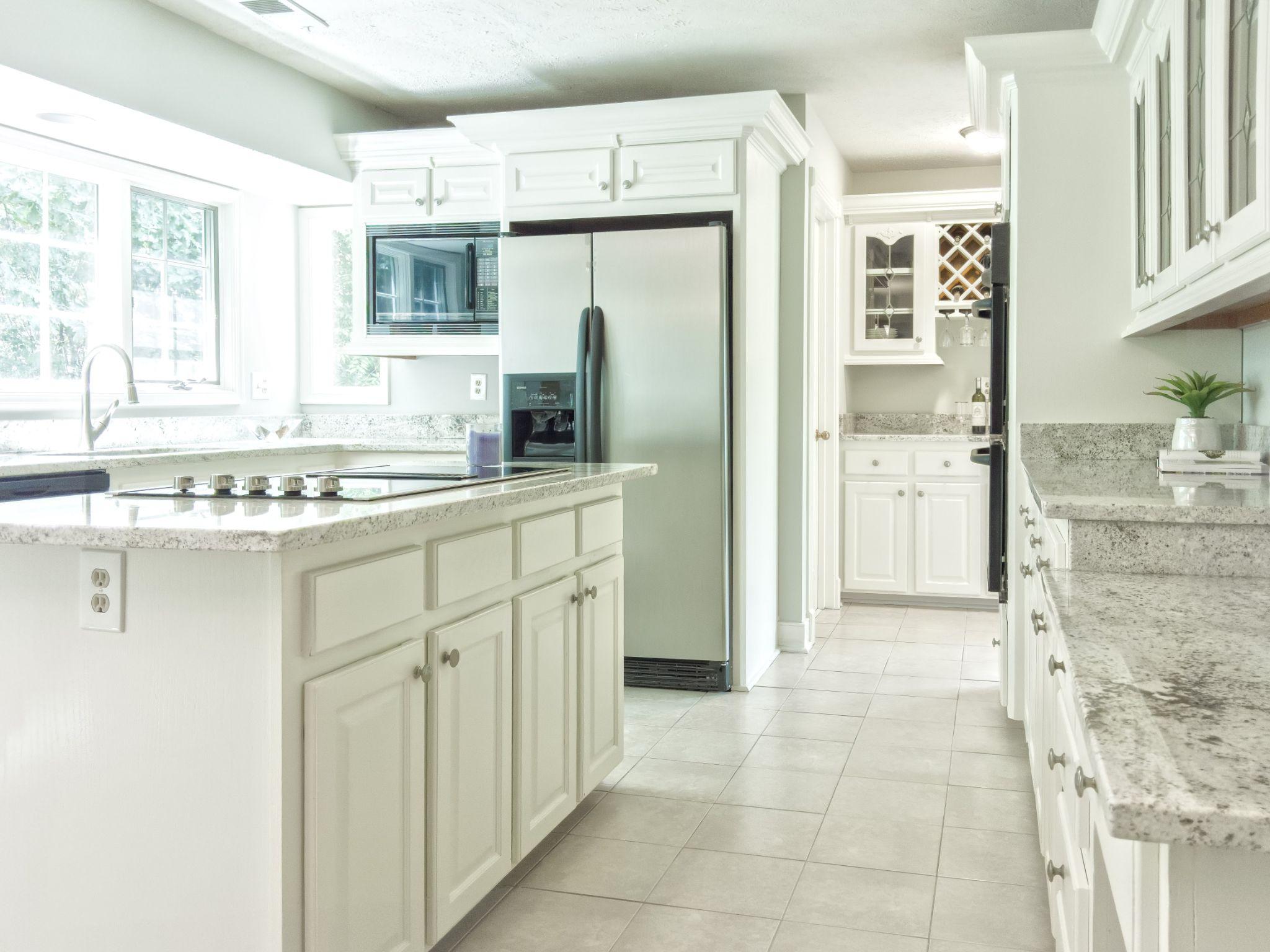 Luxurious modern kitchen interior with white wooden kitchen cabinet
